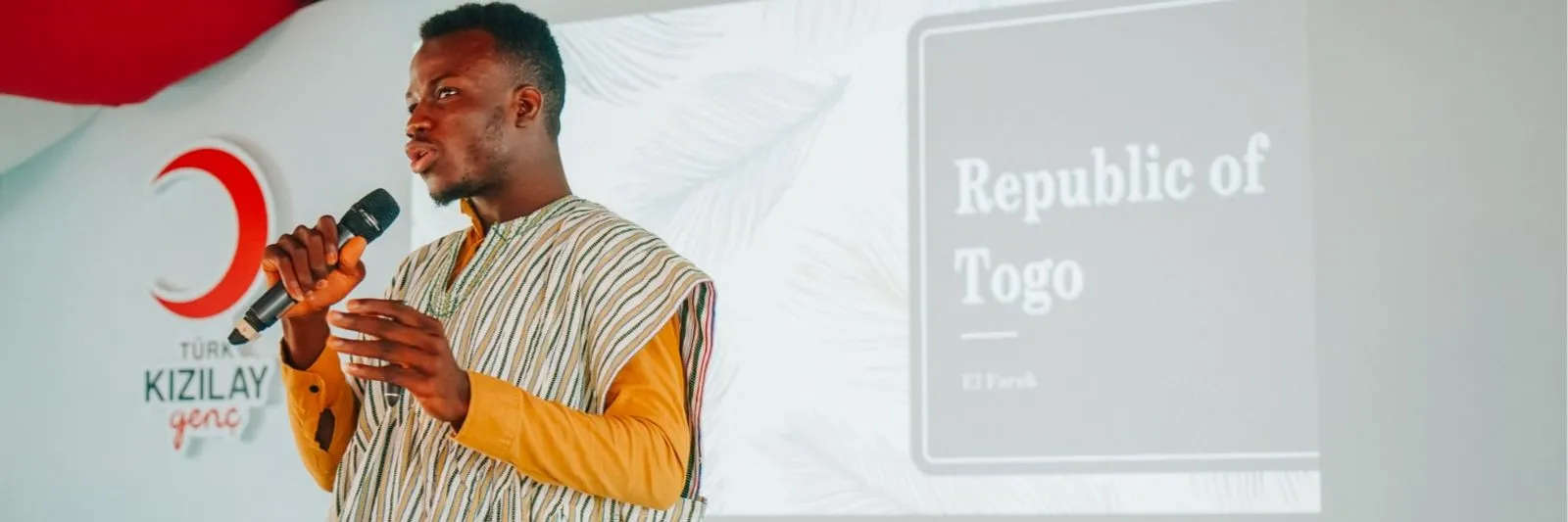 Faroukou Mintoiba speaking at a conference